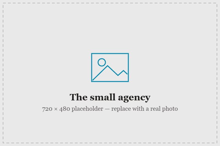 A small agency team around a laptop